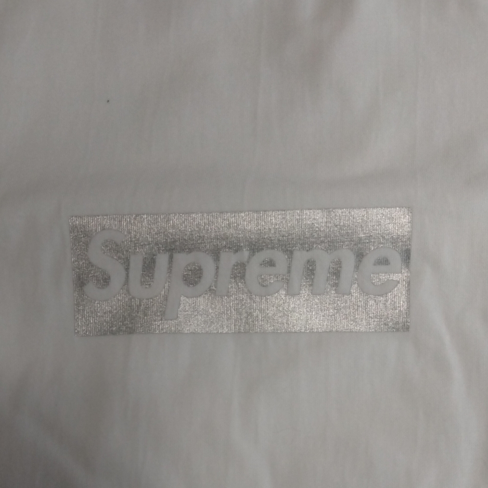 Supreme White T-Shirt with Silver Logo. Chicago Store